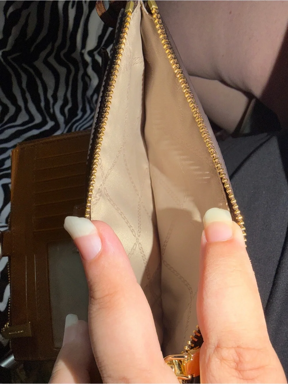 Michael Kors Brown Wristlet with Blue and Light Blue Stripes